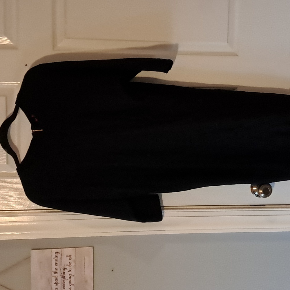 Black sweater dress with copper zipper in back. Size small